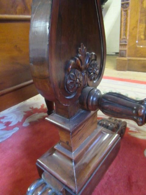 A REGENCY ROSEWOOD PILLAR END LIBRARY TABLE Image