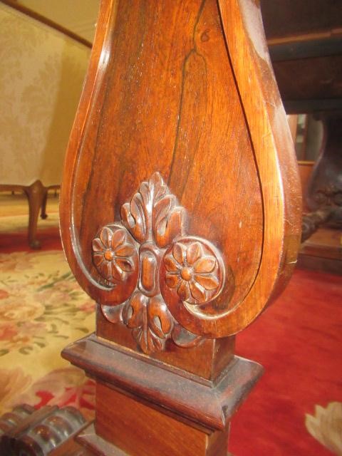 A REGENCY ROSEWOOD PILLAR END LIBRARY TABLE Image