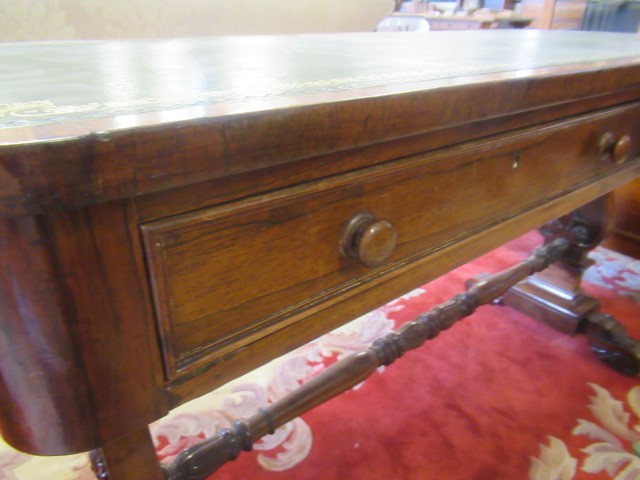 A REGENCY ROSEWOOD PILLAR END LIBRARY TABLE Image