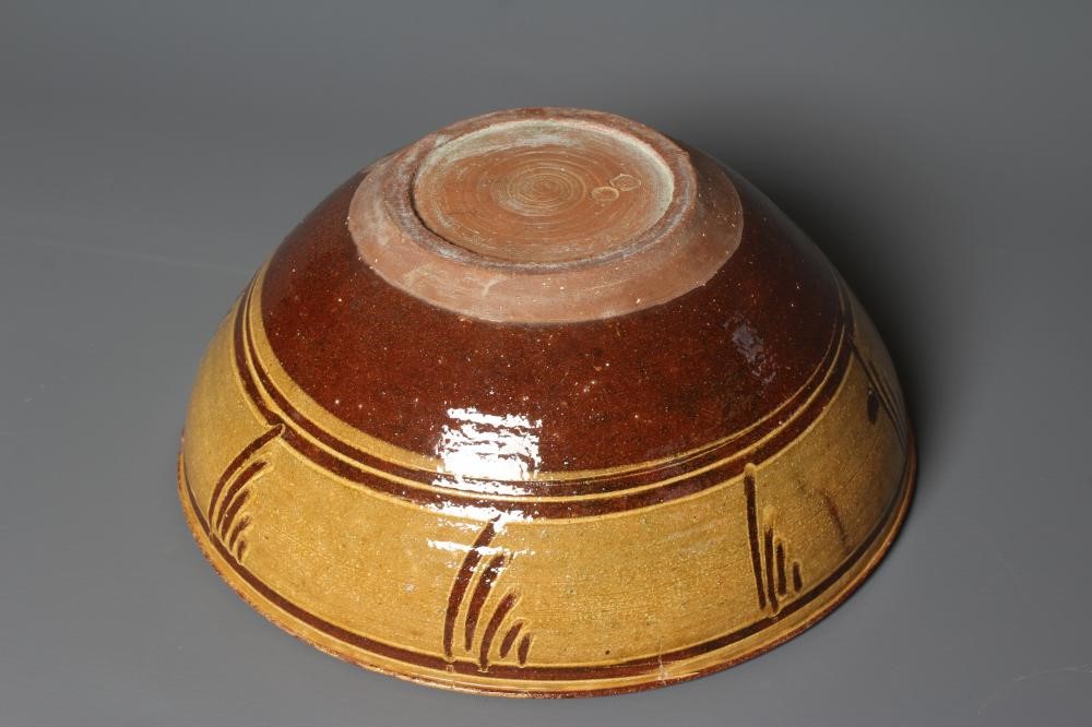 MICHAEL CARDEW (1901-1983) FOR WINCHCOMBE POTTERY A conical terracotta bowl Image