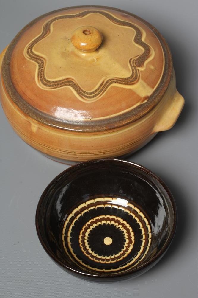 CHARLES TUSTIN (1921-1996) FOR WINCHCOMBE POTTERY A slip glazed terracotta tureen and cover of squat Image