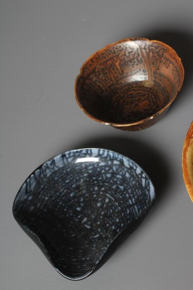 A ST. IVES POTTERY EGG CUP later painted in pale ochre Image
