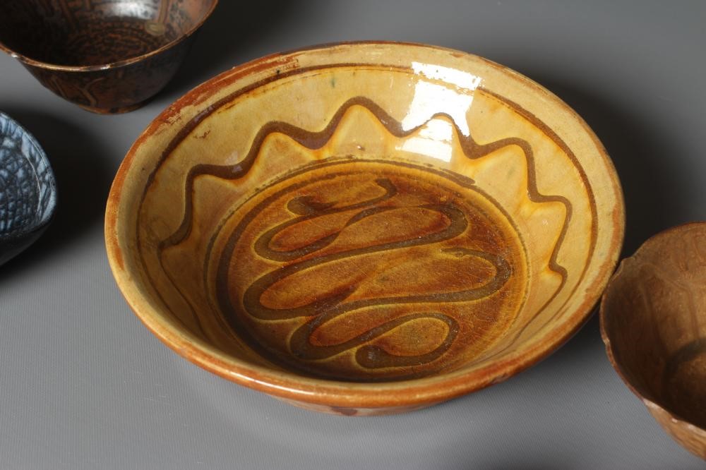 A ST. IVES POTTERY EGG CUP later painted in pale ochre Image