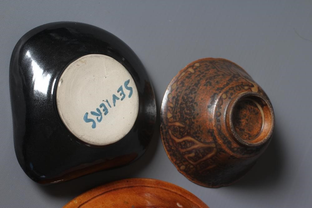 A ST. IVES POTTERY EGG CUP later painted in pale ochre Image