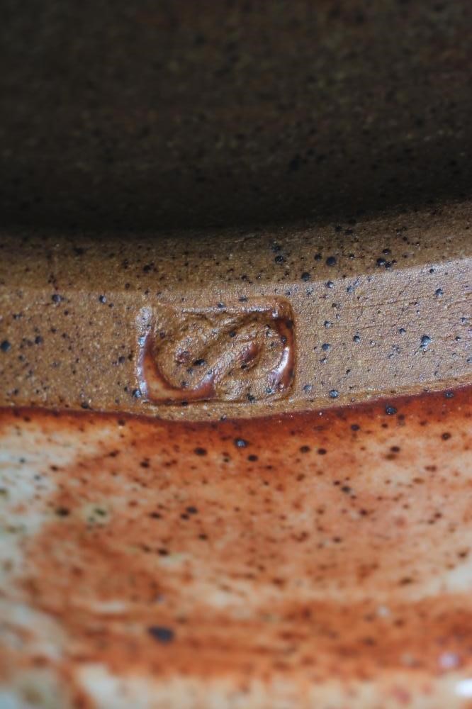 LORETTA BRAGANZA (b.1990) An abstract shaped triangular stoneware sculpture with white incising on a Image