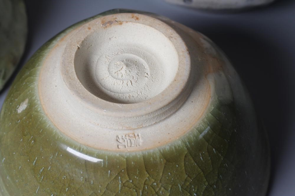 A COLLECTION OF JAPANESE VASES AND BOWLS including a pale celadon glazed globular vase with incised Image