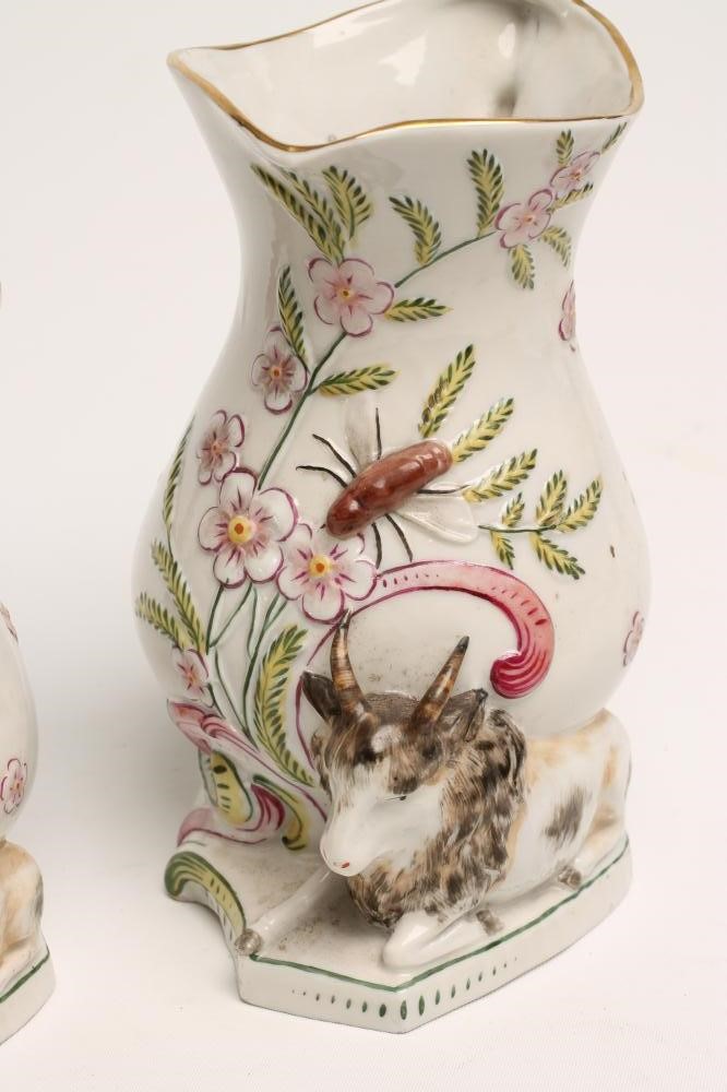 A GRADUATED SET OF THREE CONTINENTAL PORCELAIN "GOAT AND BEE" JUGS Image