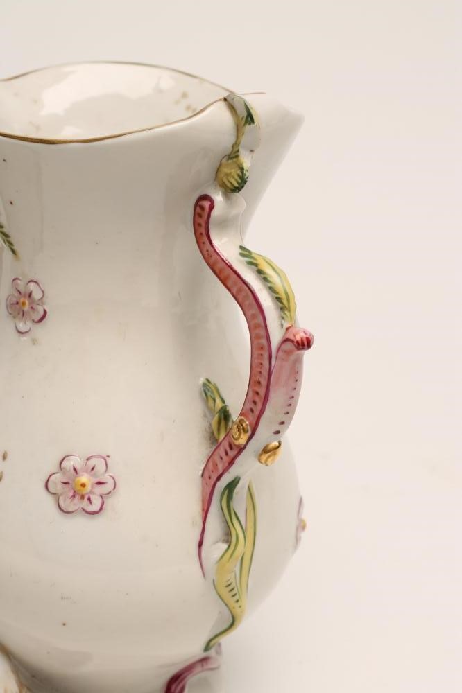 A GRADUATED SET OF THREE CONTINENTAL PORCELAIN "GOAT AND BEE" JUGS Image