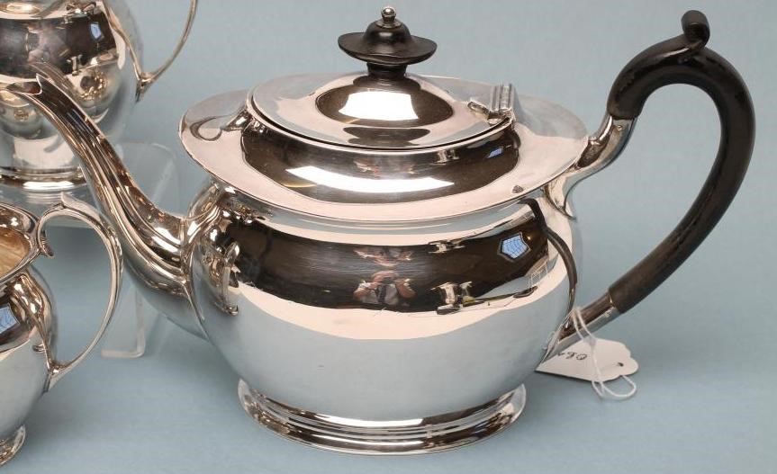 *A COMPOSITE THREE PIECE SILVER TEA SERVICE Image