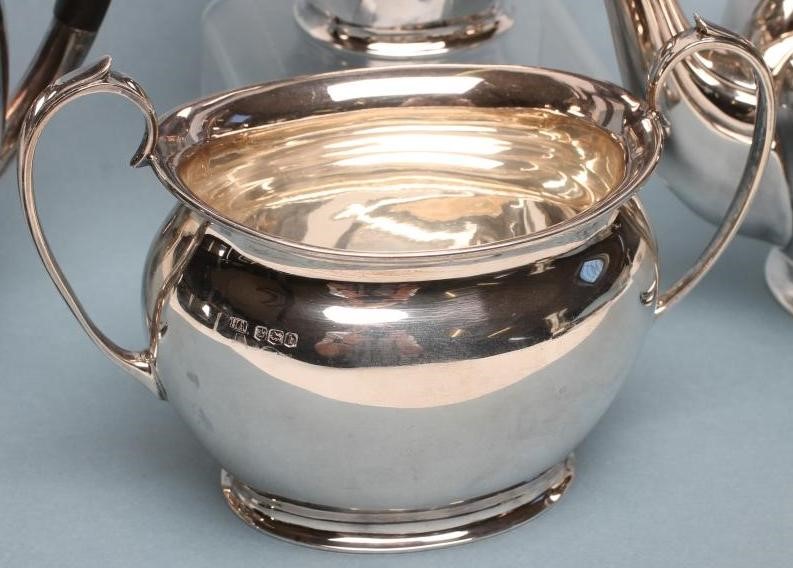 *A COMPOSITE THREE PIECE SILVER TEA SERVICE Image