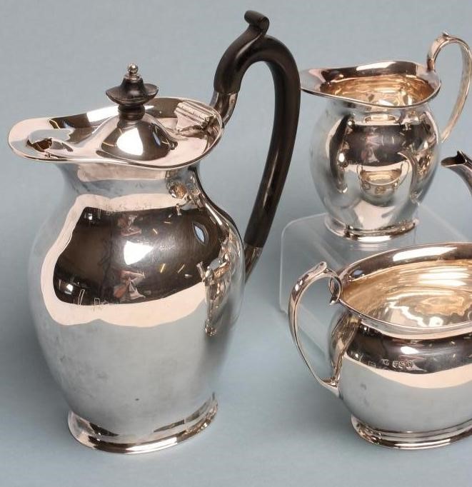 *A COMPOSITE THREE PIECE SILVER TEA SERVICE Image