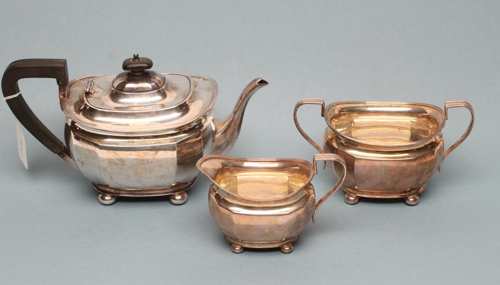 *A THREE PIECE SILVER TEA SERVICE Image