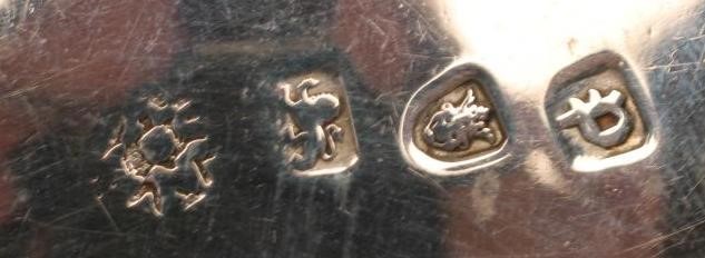 A GEORGE III SILVER SAUCEBOAT Image