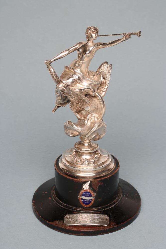 OF VETERAN MOTORCYCLING AND LOCAL INTEREST - A SILVER FIGURAL TROPHY Image
