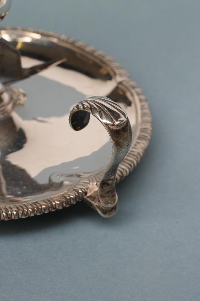 A GEORGE III SILVER CHAMBERSTICK Image