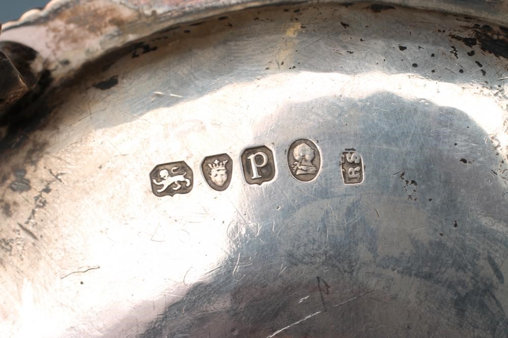 A GEORGE III SILVER CHAMBERSTICK Image