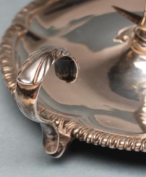 A GEORGE III SILVER CHAMBERSTICK Image
