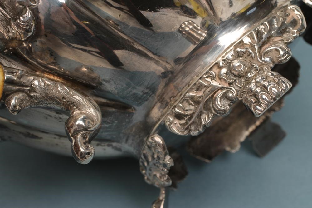 A WILLIAM IV SCOTTISH FOUR PIECE SILVER TEA AND COFFEE SERVICE Image