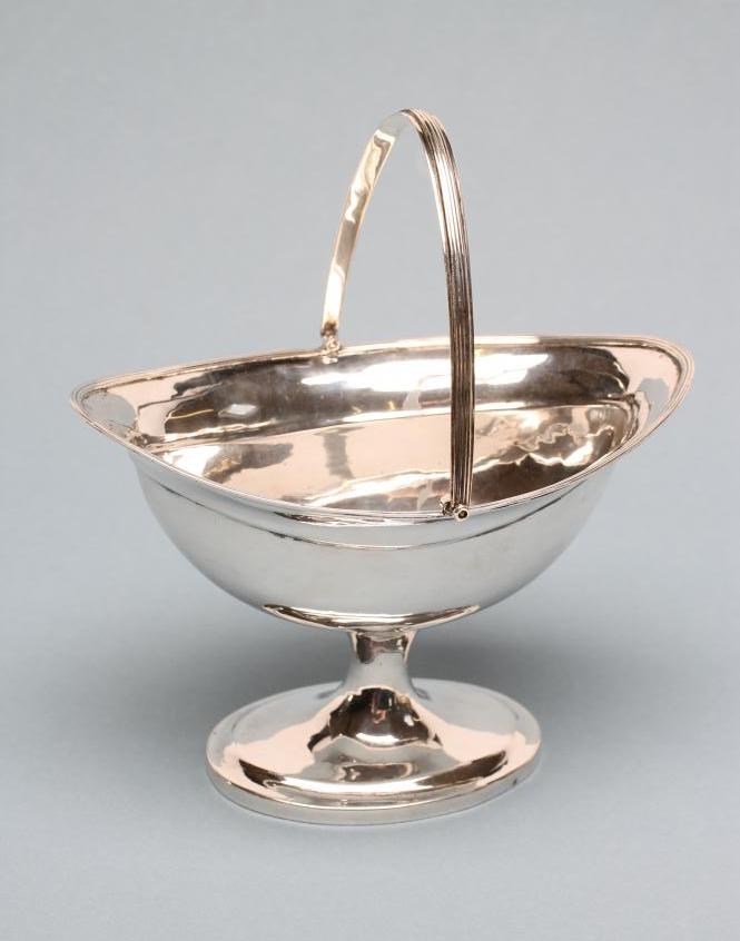 A GEORGE III IRISH SILVER SUGAR BASKET Image