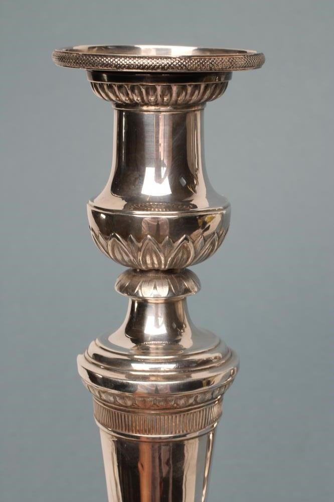 A COMPOSITE PAIR OF LATE GEORGE III SILVER CANDLESTICKS Image