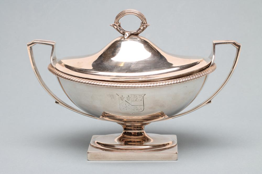 A LATE GEORGE III SILVER SAUCE TUREEN Image