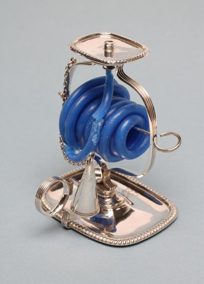 A LATE GEORGE III SILVER WAX JACK Image