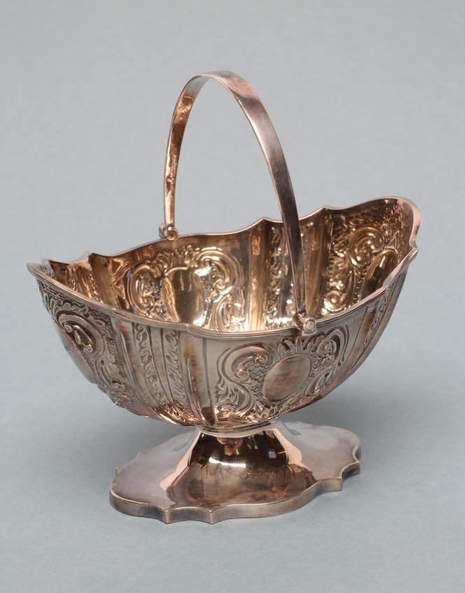 A LATE VICTORIAN SILVER SUGAR BASKET Image