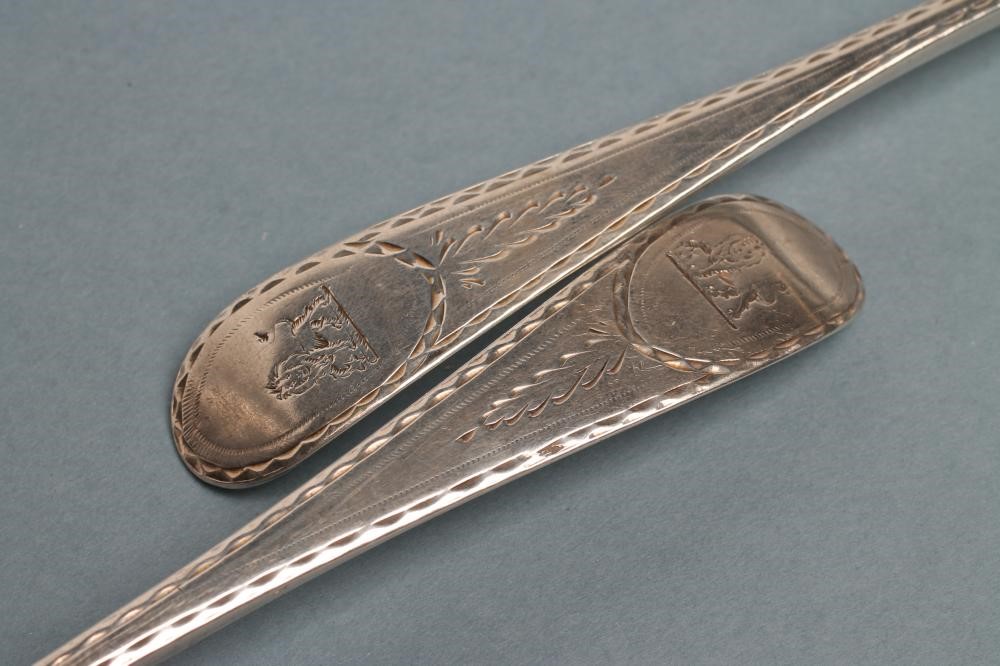 A PAIR OF GEORGE III IRISH SILVER TABLESPOONS Image