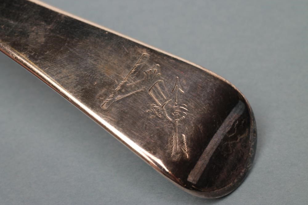 A GEORGE III SILVER SOUP LADLE Image