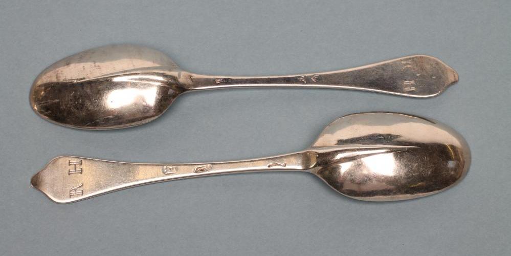 A PAIR OF QUEEN ANNE SILVER "DOG NOSE" SPOONS Image
