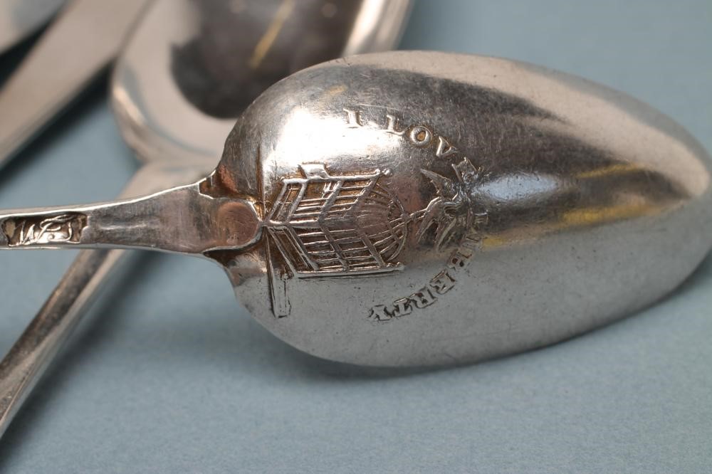 A SET OF SIX GEORGE III SILVER "LIBERTY" TEASPOONS Image