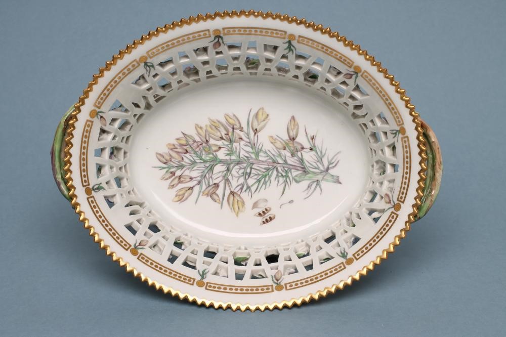 A ROYAL COPENHAGEN PORCELAIN "FLORA DANICA" BASKET of flared oval form with two naturalistic twig Image
