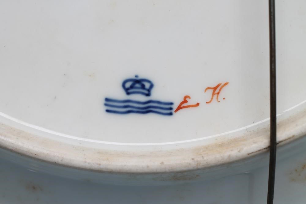 A ROYAL COPENHAGEN PORCELAIN "FLORA DANICA" PLATE of plain circular form centrally painted with Image