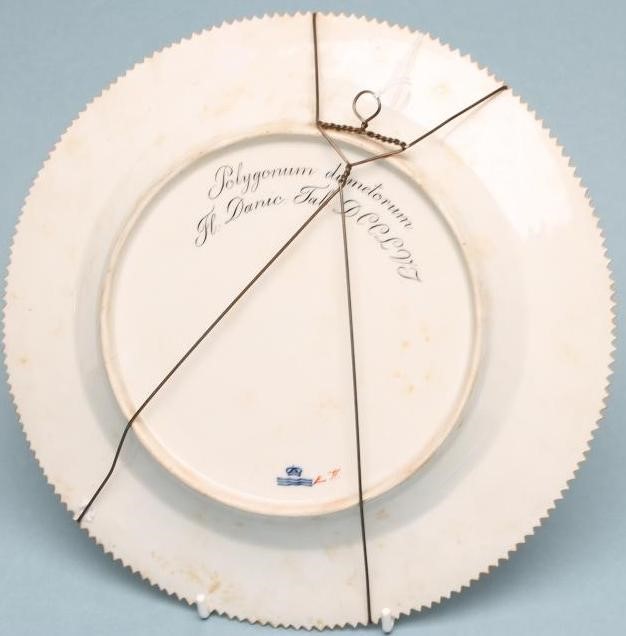 A ROYAL COPENHAGEN PORCELAIN "FLORA DANICA" PLATE of plain circular form centrally painted with Image