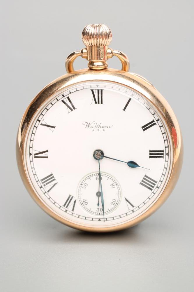 A 9CT GOLD WALTHAM TOP WIND POCKET WATCH Image