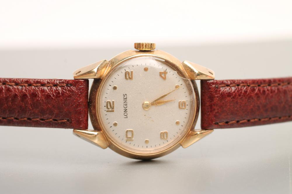 A LADY'S 9CT GOLD LONGINES WRISTWATCH Image