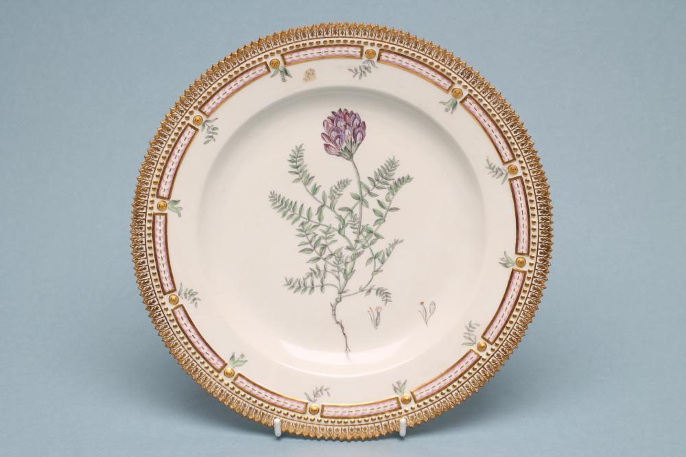 A ROYAL COPENHAGEN PORCELAIN "FLORA DANICA" PLATE centrally painted with "Astragalus arenarius" Image