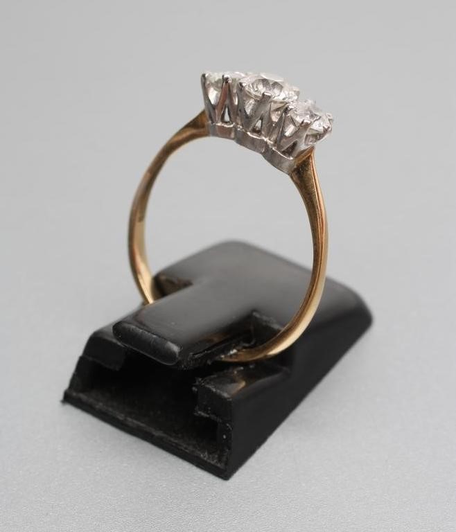 A THREE STONE DIAMOND RING Image
