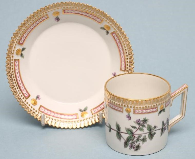 A ROYAL COPENHAGEN PORCELAIN "FLORA DANICA" CAN AND SAUCER Image