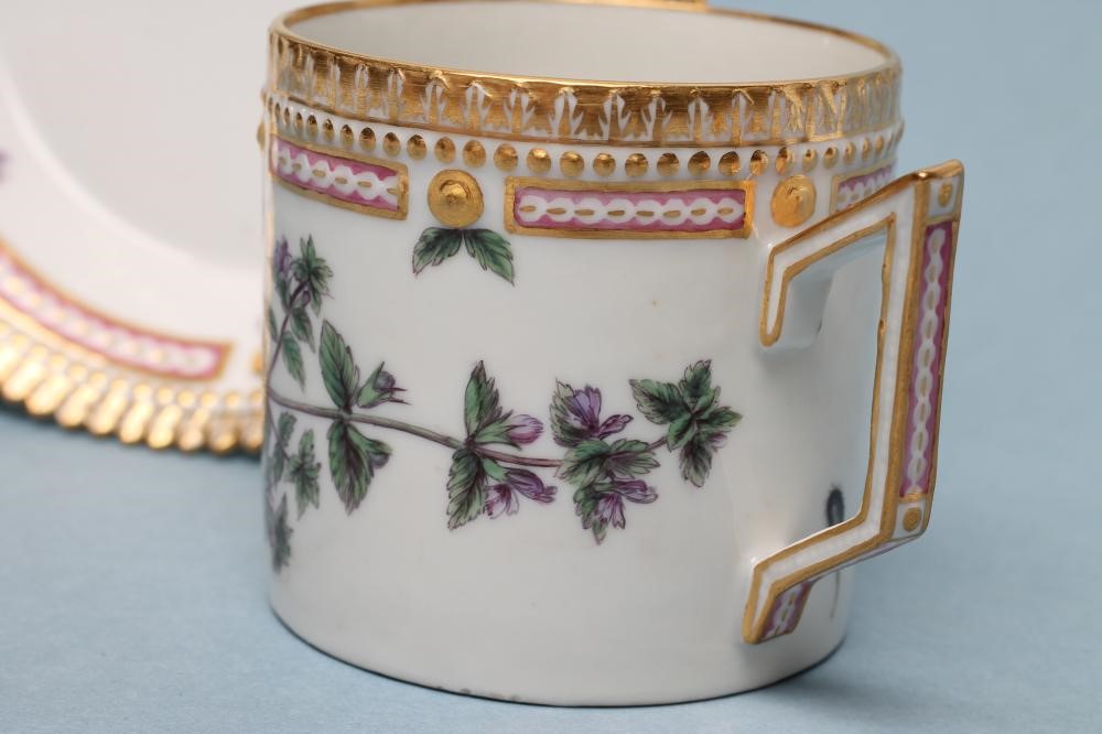 A ROYAL COPENHAGEN PORCELAIN "FLORA DANICA" CAN AND SAUCER Image