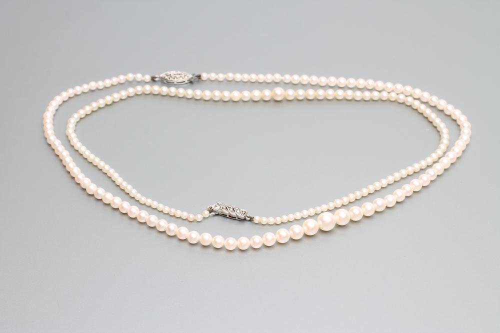 TWO SINGLE STRAND CULTURED PEARL NECKLACES Image
