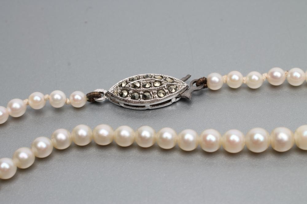 TWO SINGLE STRAND CULTURED PEARL NECKLACES Image