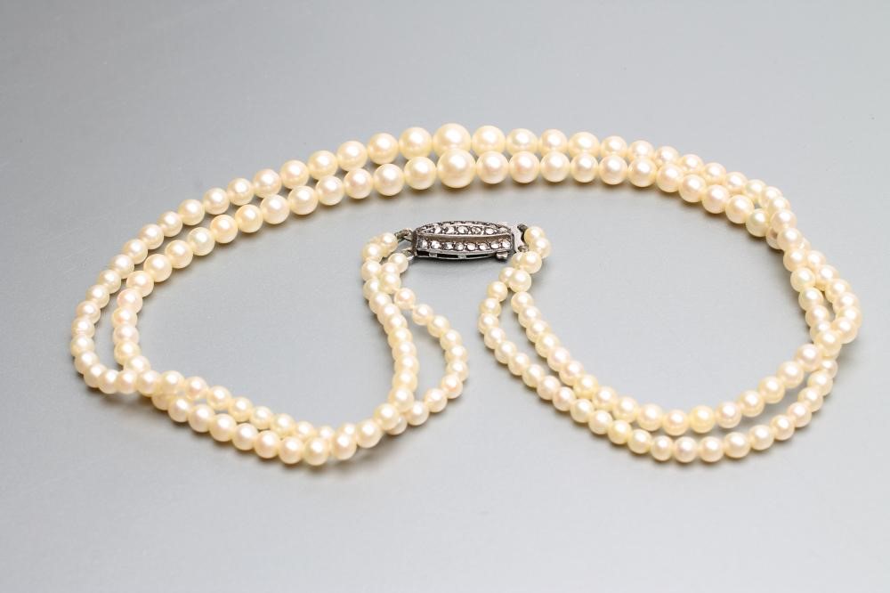 TWO SINGLE STRAND CULTURED PEARL NECKLACES Image
