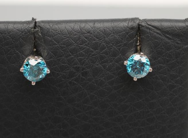 A PAIR OF BLUE DIAMOND EAR STUDS Image
