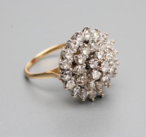 A DIAMOND BOSS RING Image