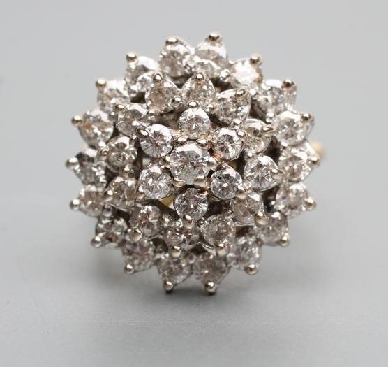 A DIAMOND BOSS RING Image