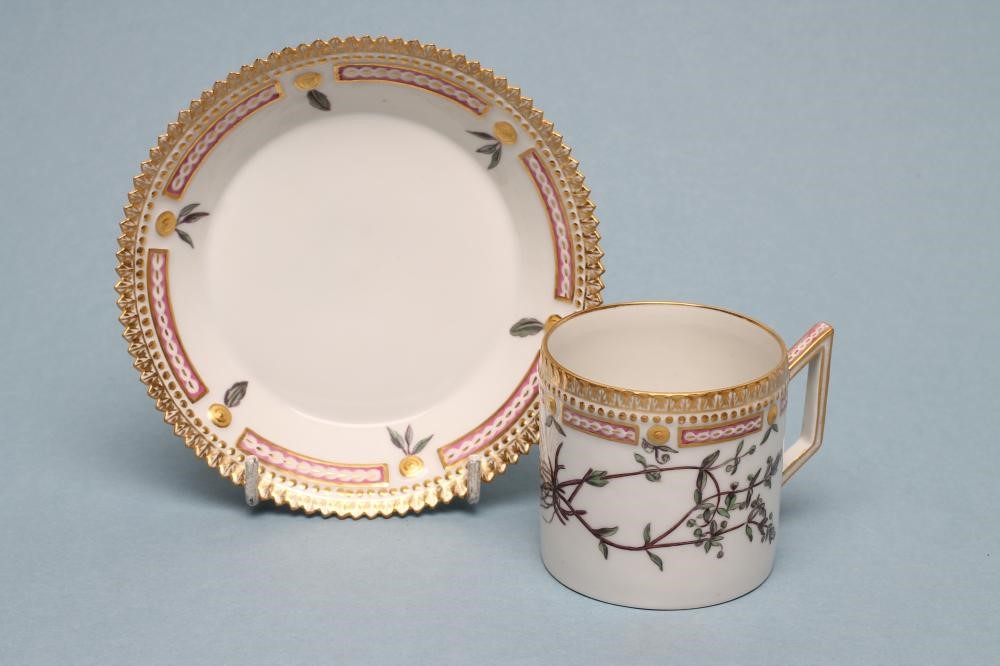 A ROYAL COPENHAGEN PORCELAIN "FLORA DANICA" CAN AND SAUCER Image