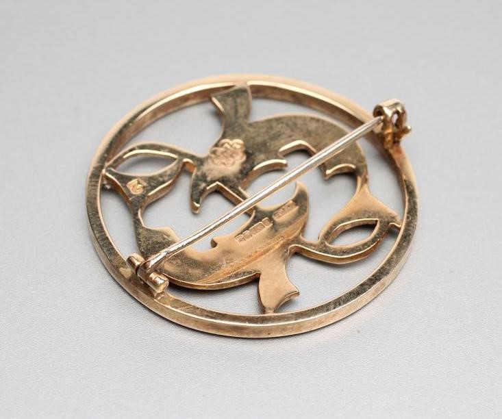 A 9CT GOLD OPEN WORK BROOCH designed by G. Bellamy for Ivan Tarrant Image