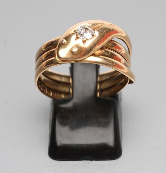 A GENTLEMAN'S 18CT GOLD SNAKE RING Image