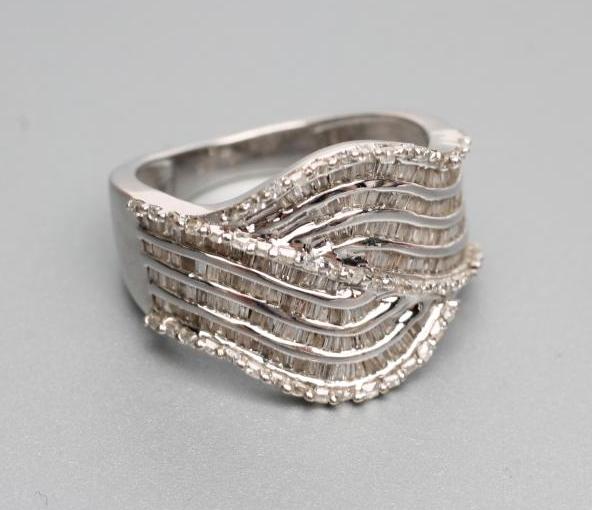 A DIAMOND COCKTAIL RING Image